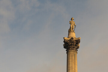 Nelson column in Trafalgar Square, London at sunset