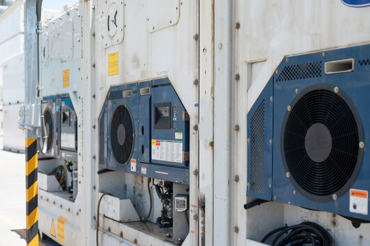 Shipping reefer container with electric socket plug at the port.