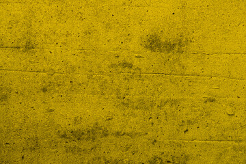 Yellow wall old paint background texture of plaster and grey cement