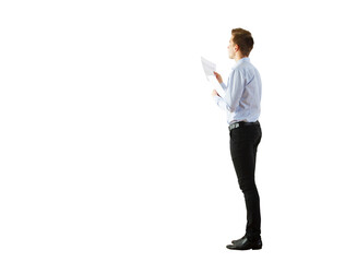 Man in casual office attire holding a paper, standing sideways. Isolated on a clean white background. Concept of business, reading, or analysis