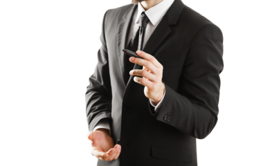 Businessman in a suit holding a pen with one hand and gesturing with the other, isolated on a white background. Concept of professionalism