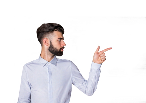 Man with beard in formal white shirt pointing sideways, isolated on a clean white background. Concept of direction, gesture, and indication