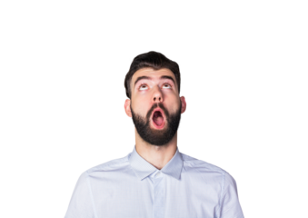 A bearded man with a surprised expression, looking upward while wearing a light checkered shirt, isolated on a clean white background