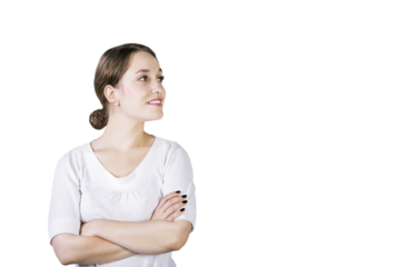 Young woman in white shirt with arms crossed, smiling and looking sideways, isolated on white background. Concept of confidence and positivity