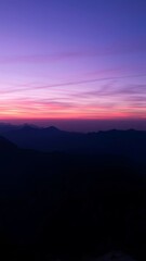 Fototapeta premium Majestic Sunset Over Mountain Peaks