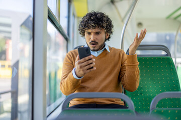 A disgruntled man received bad news and an online notification while riding public transportation