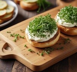 Microgreen garnishing bagel with cream cheese on a wooden cutting board, herb, green, natural light