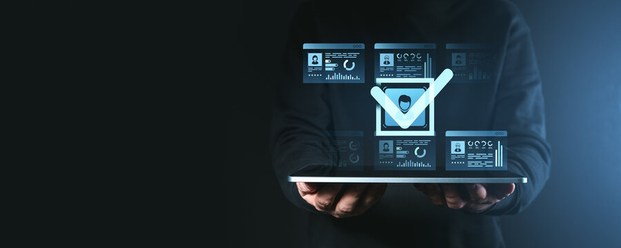 Digital identity verification concept with a holographic checkmark on a screen.