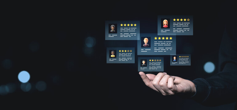 Hand showcasing digital customer reviews with star ratings and avatars on a dark blurred background, symbolizing online feedback and reputation.