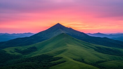 Majestic Mountain Landscape at Sunset Vibrant Pink and Orange Sky Rolling Green Hills