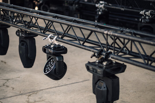 Professional lighting equipment hanging on a truss system