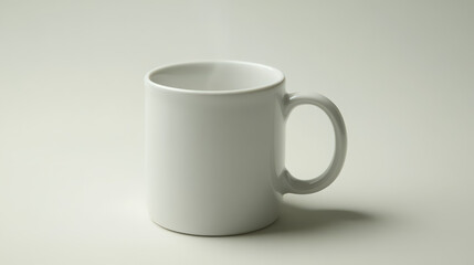 A white ceramic coffee mug with a small steam curl rising from it