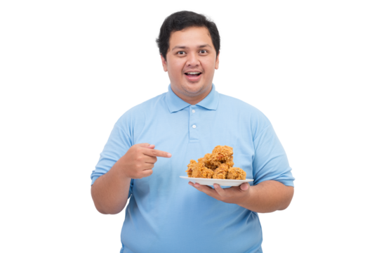 Portrait of a Fat asian man smiling holding a plate of fried chicken