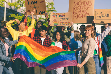 Diverse group of activists at an LGBTQ and women's rights protest
