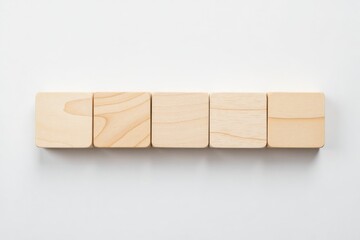 Five blank wooden blocks on a clean white background. Minimalist, template, copy space concept.