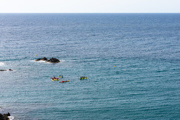 set of kayaks assembled in the middle of the sea
