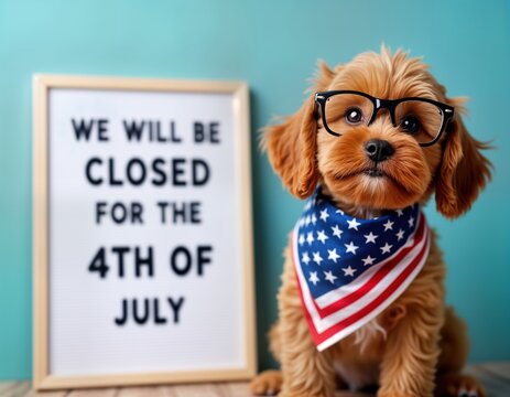 Cute brown puppy wearing American flag bandana, glasses sits indoors. Signboard announces closure for 4th of July holiday. Studio shot. Patriotic pet concept. Adorable puppy, holiday message. Perfect