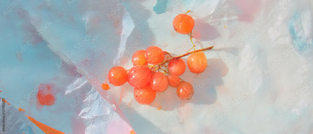 Poster minimalistic scrapbook-style composition with cloudberries on textured linen background