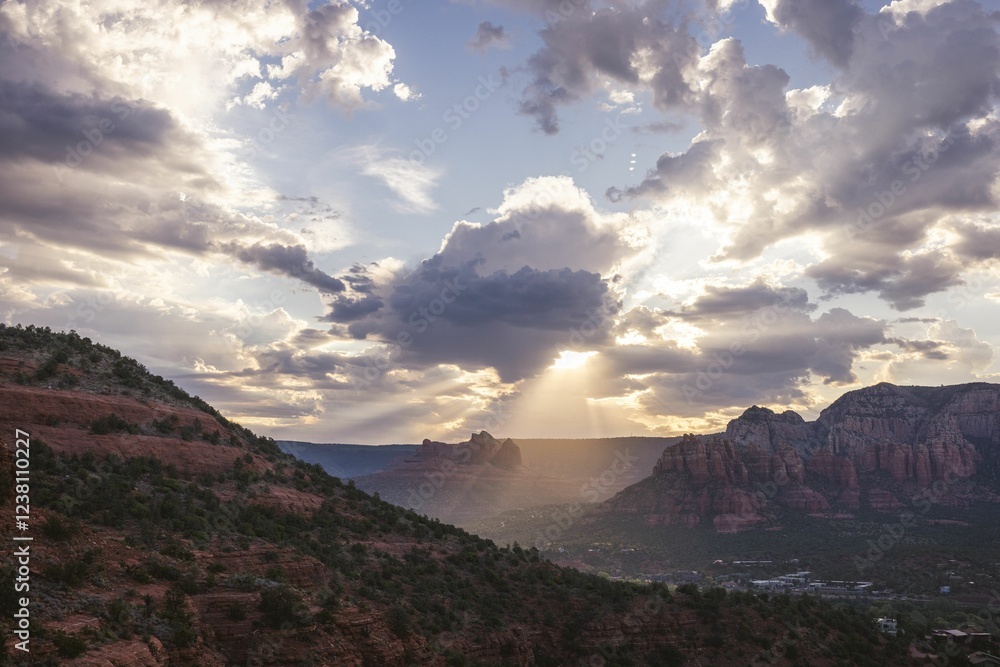 Poster Sedona's red rock formations under a dramatic sky.