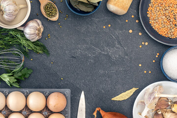 Cooking ingredients background. Food background with spices, herbs and vegetables.