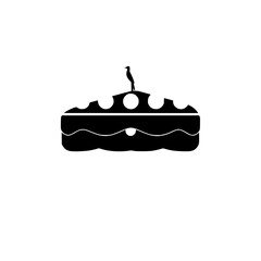 A delightful cake with a bird on top. This image is perfect for bakeries, dessert shops, and food blogs. It evokes feelings of sweetness and joy.