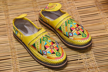 Traditional Moroccan colorful handmade leather slippers. Footwear bazaar.