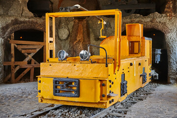 Mining locomotive and wagon transport. Tunnel entrance. Coal industry