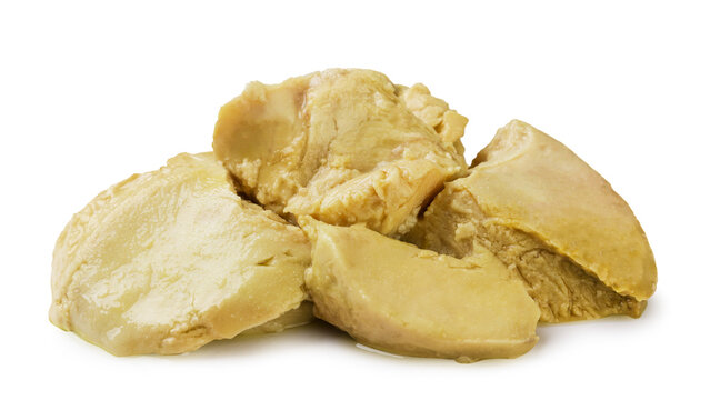 Pile of cod liver pieces on a white background. Isolated