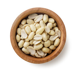 Peanuts in a wooden plate on a white background. Top view