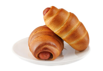 Two sausages in dough in a white plate isolated on a white background.