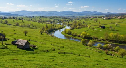 Obraz premium Serene River Valley Landscape with Green Fields and Cabin