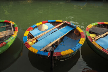 Round basket boats, woven from bamboo, are used to transport tourists in Cam Thanh nipa palm forest, Hoi An, Vietnam 