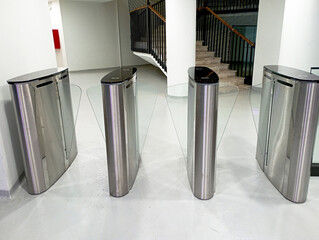 Technology idea concept used in daily life. Automatic door. Sliding barrier security system at an office building. Turnstile,