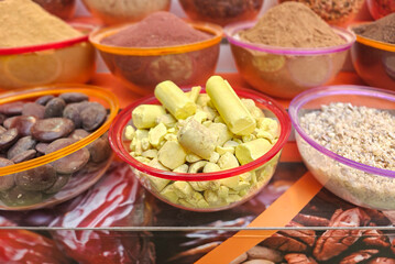 Large choice of colorful spices in the traditional arabian market in Dubai