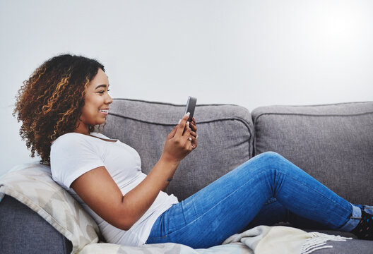 Relax, video call and woman on sofa with phone for communication, connection and technology. Home, girl or college student on couch with smartphone for social media, online chat or digital streaming