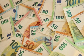Pile of euro paper banknotes as finance background