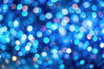 Festive blue bokeh background with blurred lights, perfect for design, offering ample left-sided copy space.
