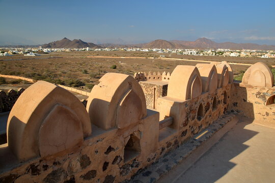 The impressive Jabreen fort in Bahla, Al Dakhiliyah, Oman, with the surrounding countryside and mountains