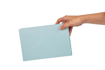 Blank blue book cover in hand on transparent background.