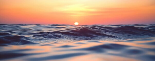 Obraz premium Sunset over ocean waves nature idea. Tranquil ocean waves reflecting the warm hues of a sunset sky.