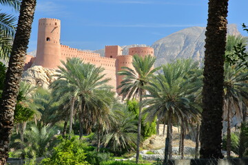 The impressive Nakhal fort, Al Batinah, Oman, with its towers and ramparts, surrounded by mountains...