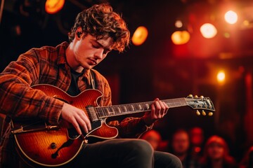 Obraz premium A musician immediately picking up their instrument after a sudden pause in a performance, with the audience quietly waiting