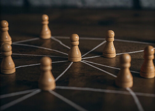 chess pieces on the board, group of people illustrated using a pawn or miniatures, connected with a lines ,networking, sharing information instantly ,expanding your world and staying informed