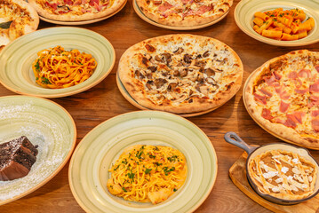 A table full of typical Italian dishes