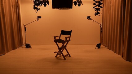 Studio for photo video production filming with lighting equipment, cyclorama and camera, director...