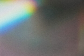 Blurred rainbow light refraction texture overlay effect for photo and mockups.
