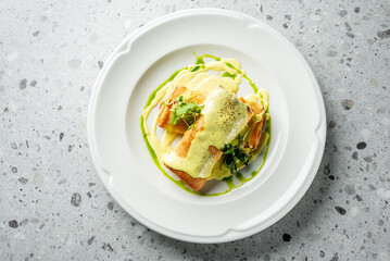 Delicious pancakes rolled and drizzled with creamy sauce, garnished with fresh greens. A visually appealing dish perfect for breakfast or brunch settings. Ideal for food-related projects.