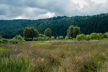 bright sunrise in the mountains with blue sky