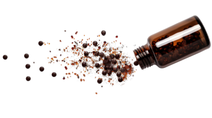 Brown glass pill bottle pouring out pills and powder on transparent background