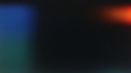 Fototapeta premium A Dark Abstract Gradient With A Deep Black Background And Hints Of Blue And Red Light.